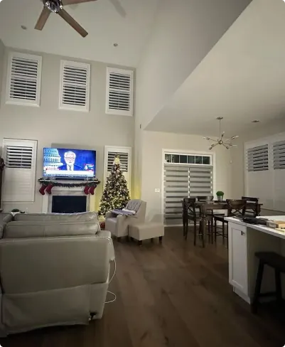 Family room window treatment coordinated with existing furniture and finishes