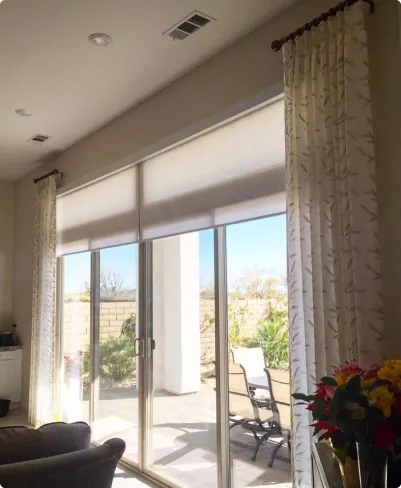 Sliding door window treatment in a bright sunroom