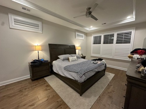 Traditional shutter and curtain pairing for a classic interior