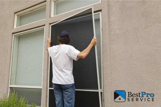 On site screen repair technician working on a window screen